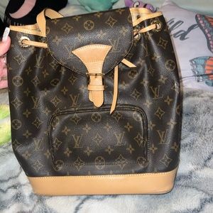 Lv backpack with broken strap.